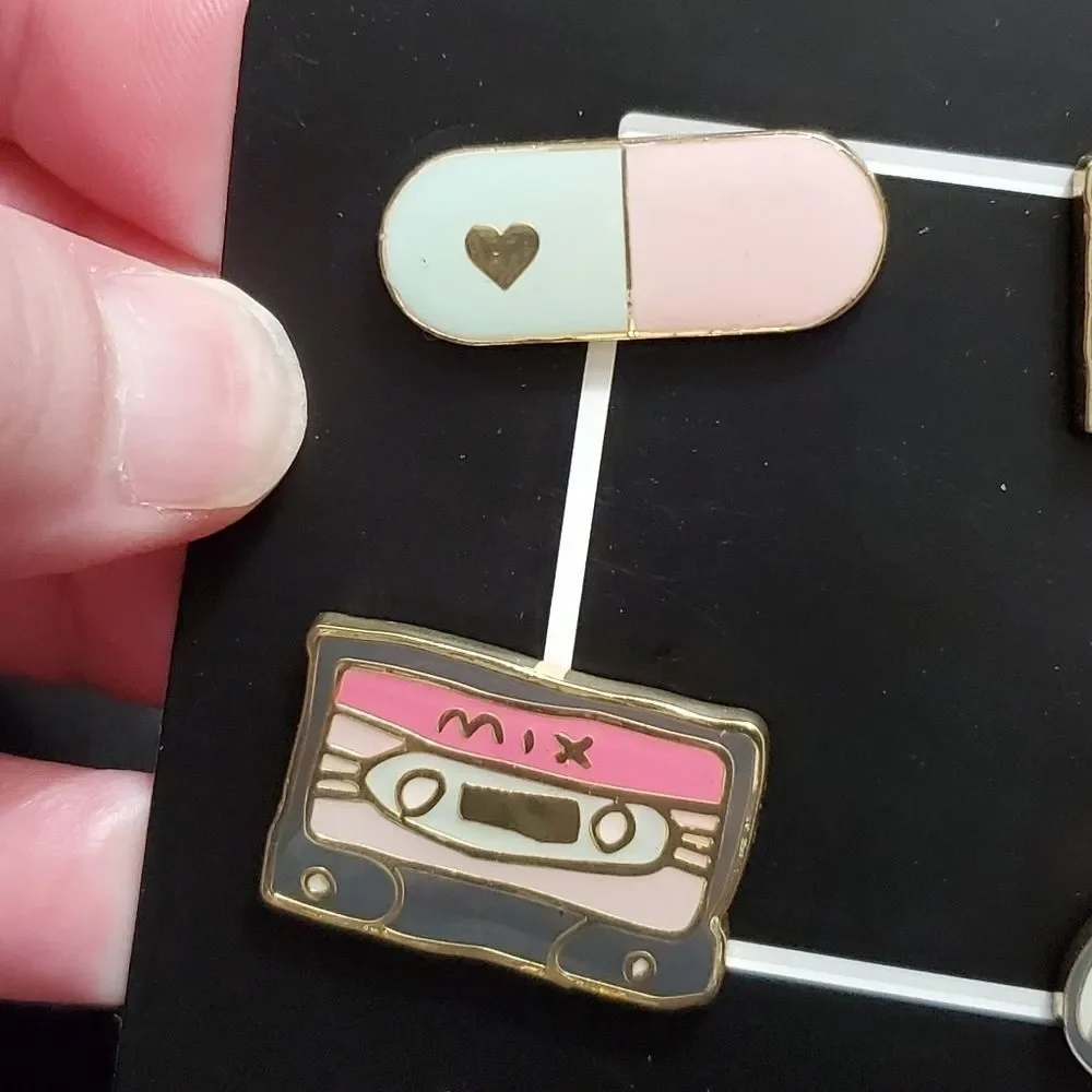 Gold tone set of 4 enamel pins